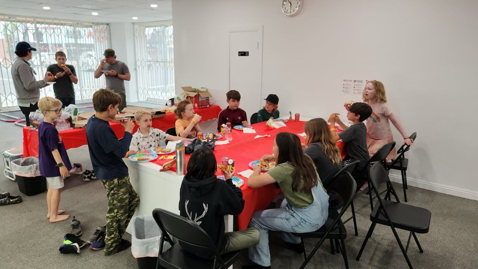 Kids at the party table during an RC car birthday party in Lawndale